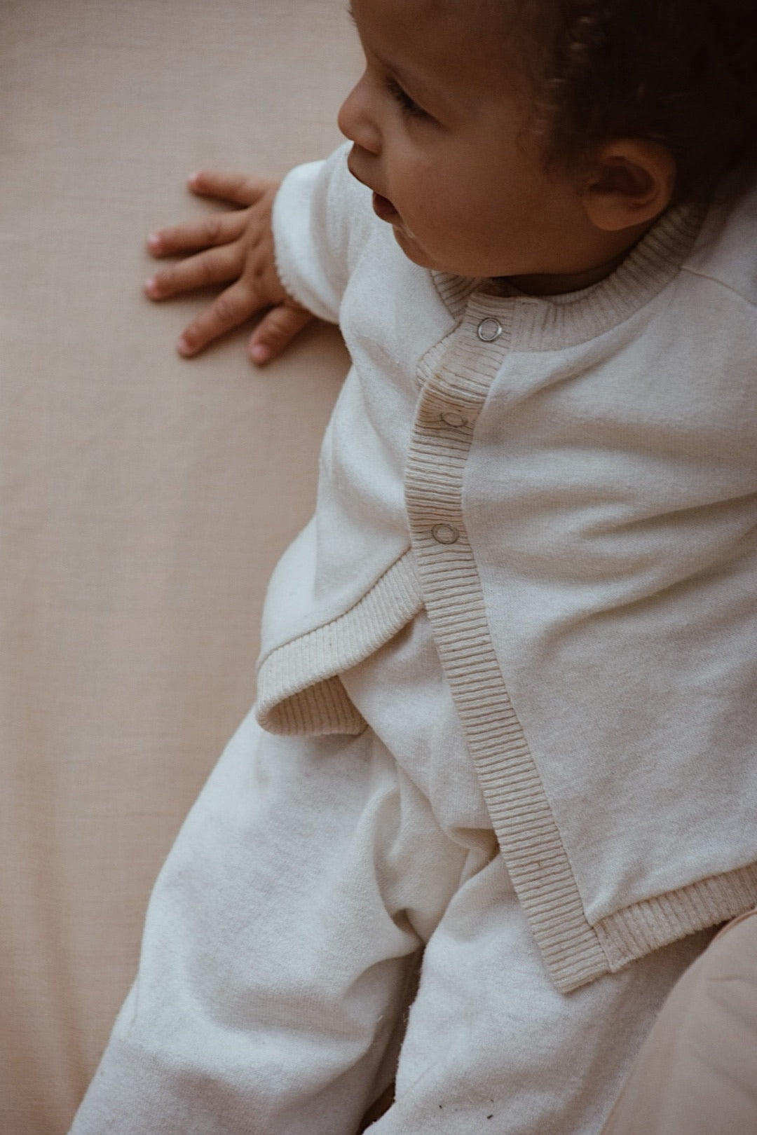 a unisex three-snap sweater with a boxy & slightly cropped. made of natural hemp/organic cotton French Terry with natural cotton 2x1 army rib. destined for heirloom status.ethically made with love, by calgary childrenswear company, cabane.